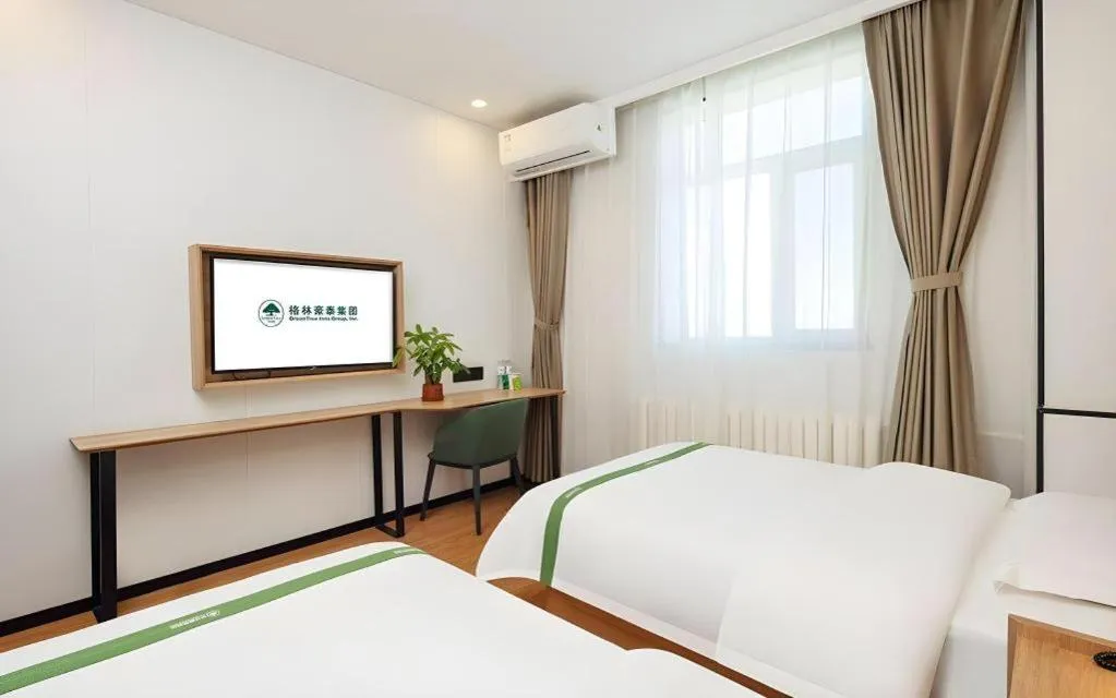 Bed in GreenTree Inn Beijing Fengtai Dongda Street Express Hotel