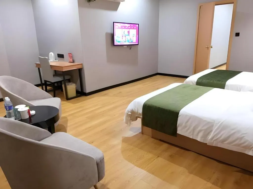 Bed in GreenTree Inn Yixing Zhangzhu Express Hotel