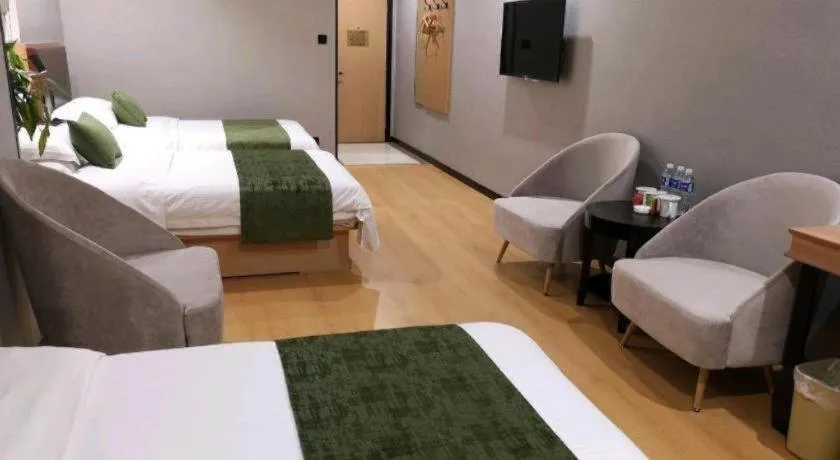 Bed in GreenTree Inn Yixing Zhangzhu Express Hotel