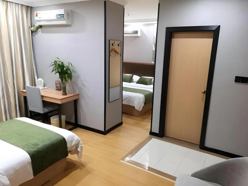 Bed in GreenTree Inn Yixing Zhangzhu Express Hotel