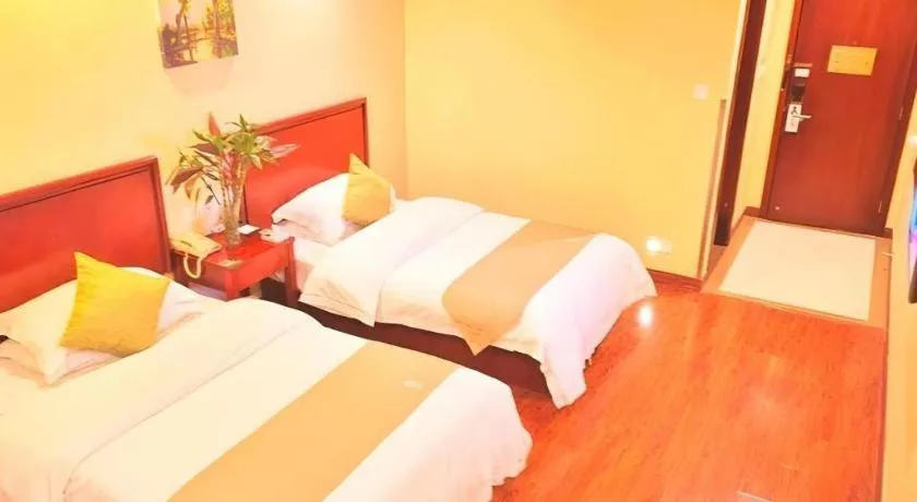 Bed in GreenTree Inn Yixing Zhangzhu Express Hotel