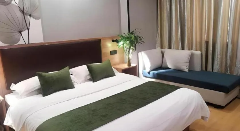 Bed in GreenTree Inn Yixing Zhangzhu Express Hotel