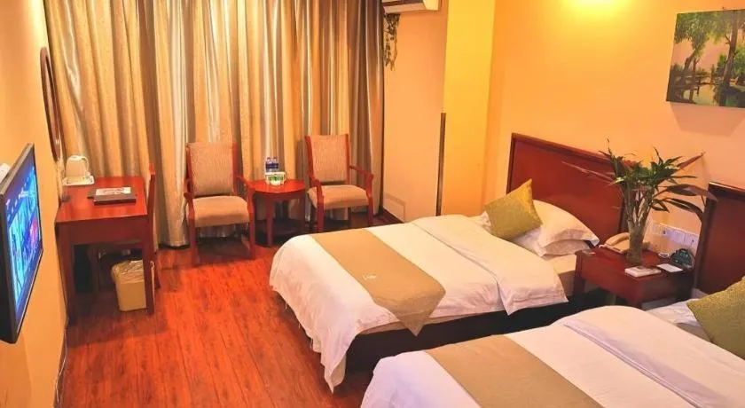 Bed in GreenTree Inn Yixing Zhangzhu Express Hotel