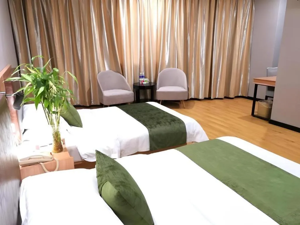 Bed in GreenTree Inn Yixing Zhangzhu Express Hotel