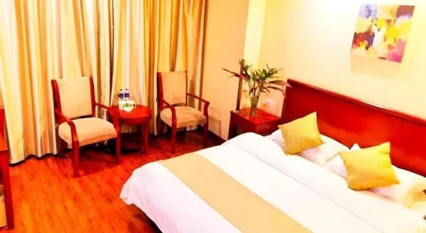 Bed in GreenTree Inn Yixing Zhangzhu Express Hotel
