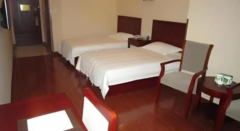 Bed in GreenTree Inn Yixing Zhangzhu Express Hotel