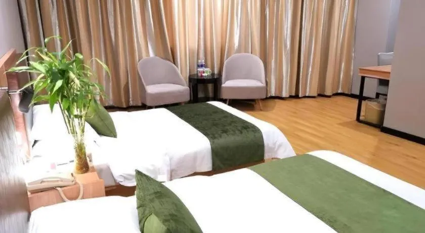 Bed in GreenTree Inn Yixing Zhangzhu Express Hotel