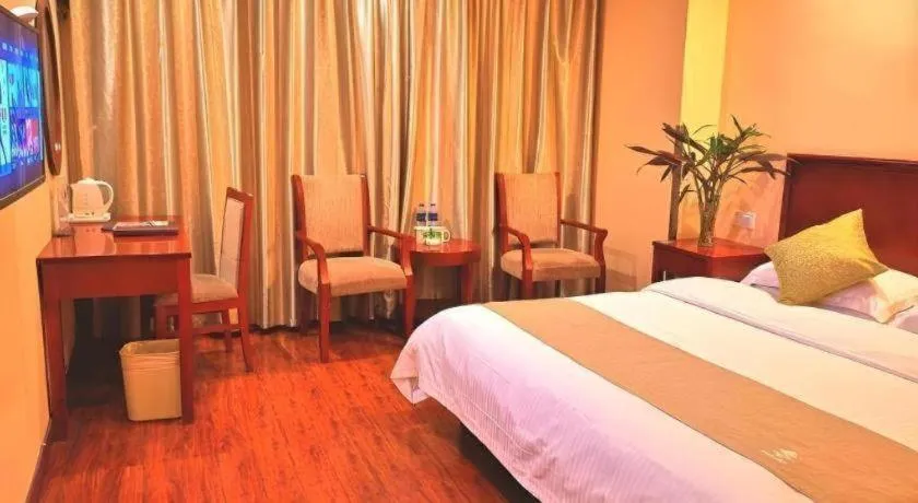 Bed in GreenTree Inn Yixing Zhangzhu Express Hotel
