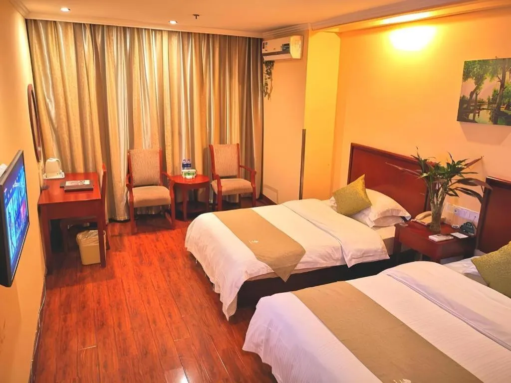 Bed in GreenTree Inn Yixing Zhangzhu Express Hotel