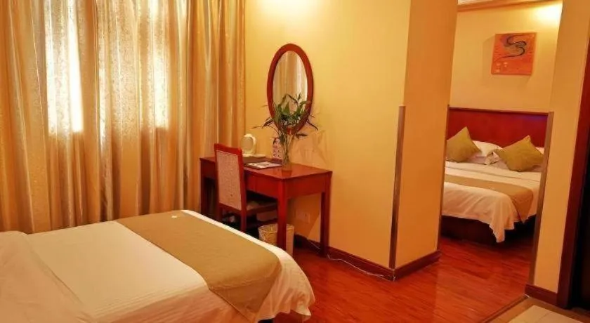 Bed in GreenTree Inn Yixing Zhangzhu Express Hotel