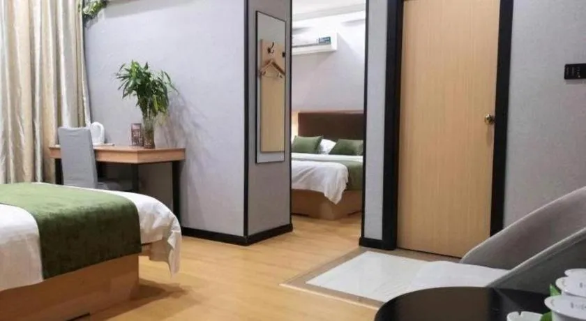 Bed in GreenTree Inn Yixing Zhangzhu Express Hotel