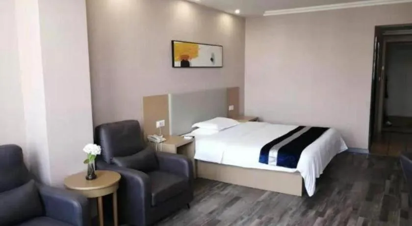 Bed in GreenTree Inn Nantong Haian Kaifa District Express Hotel