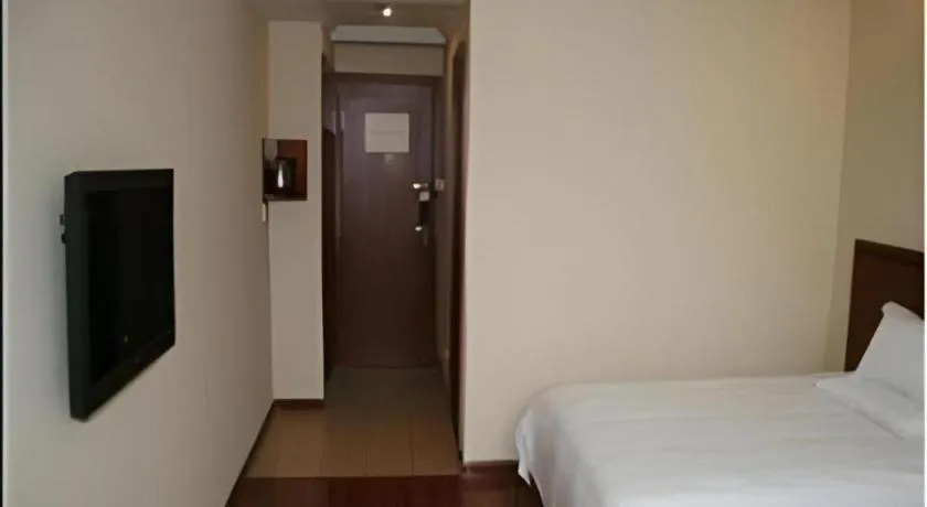 Bed in GreenTree Inn Nantong Haian Kaifa District Express Hotel