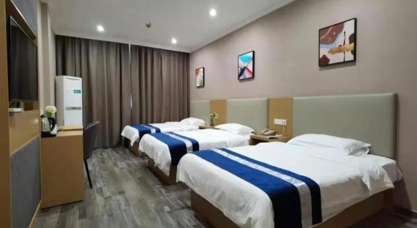 Bed in GreenTree Inn Nantong Haian Kaifa District Express Hotel