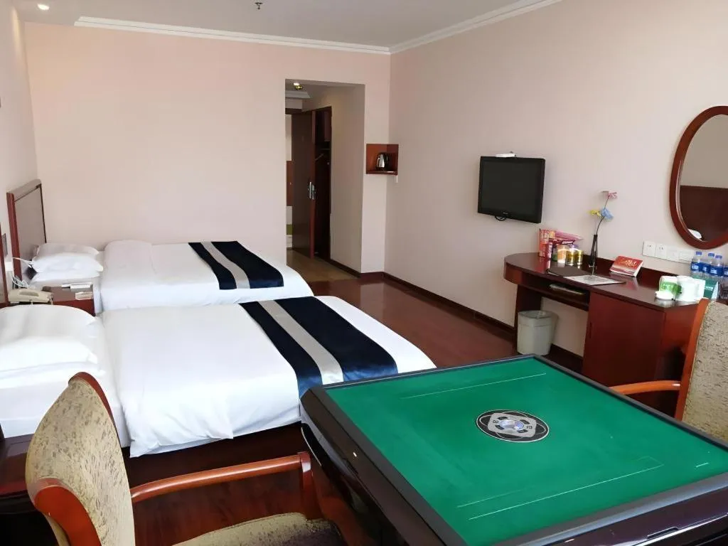 Bed in GreenTree Inn Nantong Haian Kaifa District Express Hotel