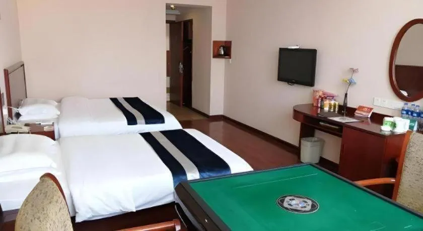 Bed in GreenTree Inn Nantong Haian Kaifa District Express Hotel