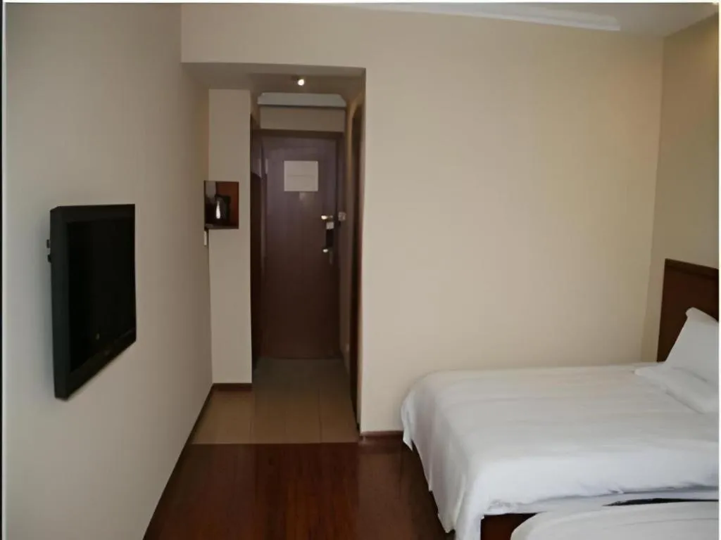 Bed in GreenTree Inn Nantong Haian Kaifa District Express Hotel