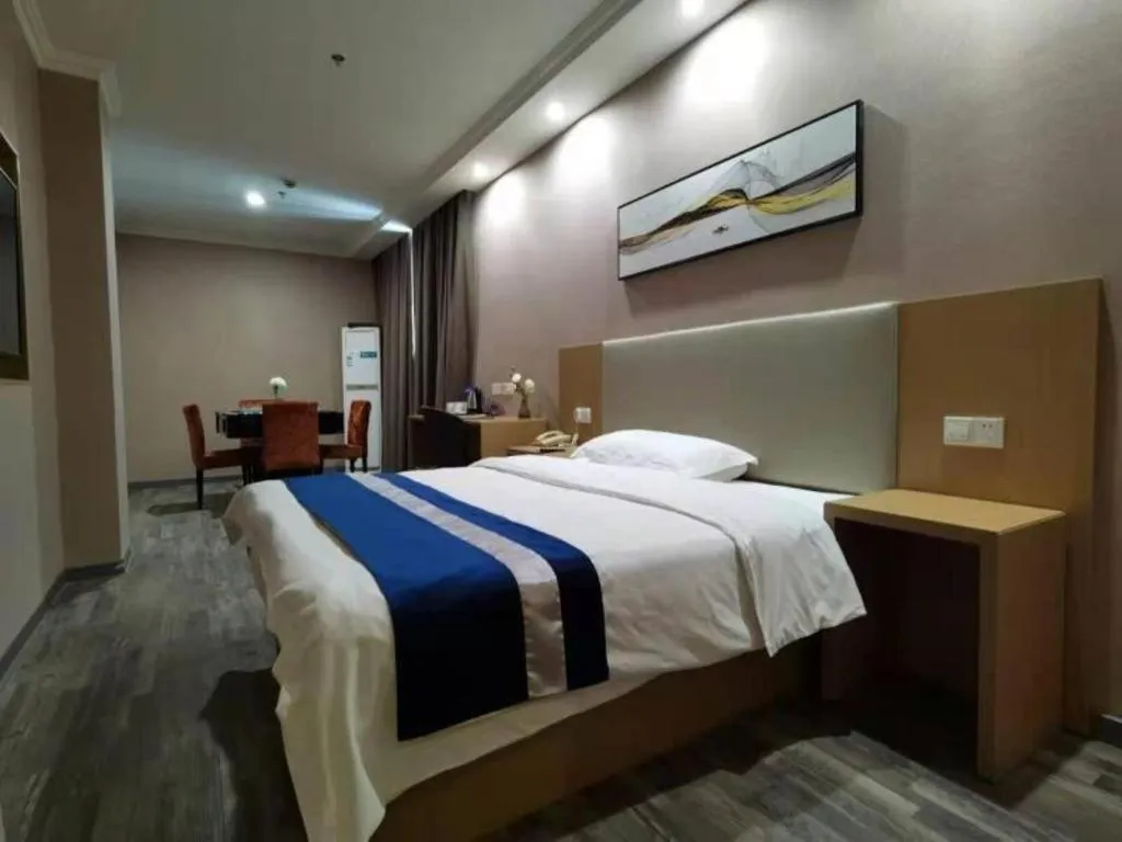 Bed in GreenTree Inn Nantong Haian Kaifa District Express Hotel