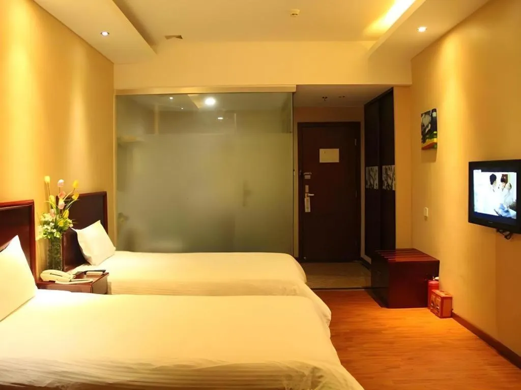 Bed in GreenTree Inn Guangzhou Panyu Bus Station Business Hotel