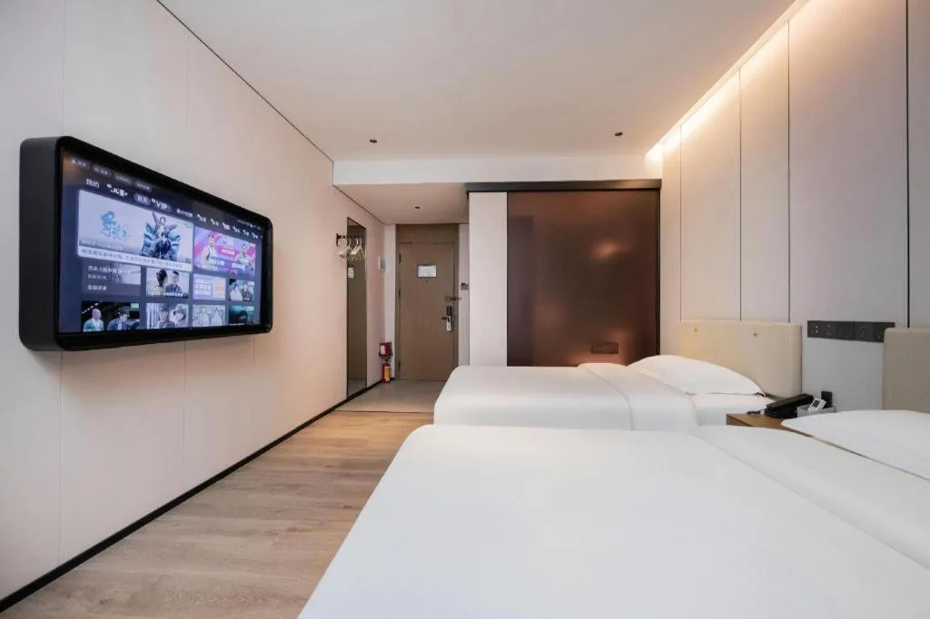 Bed in GreenTree Inn Guangzhou Panyu Bus Station Business Hotel