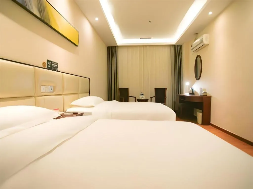 Bed in GreenTree Inn Guangzhou Panyu Bus Station Business Hotel