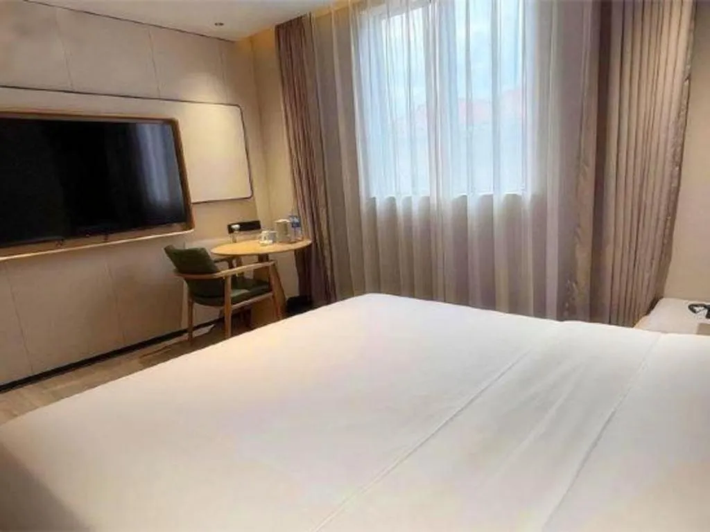 Bed in GreenTree Inn Guangzhou Panyu Bus Station Business Hotel