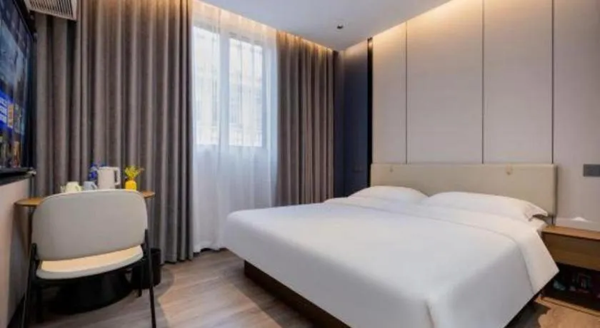 Bed in GreenTree Inn Guangzhou Panyu Bus Station Business Hotel