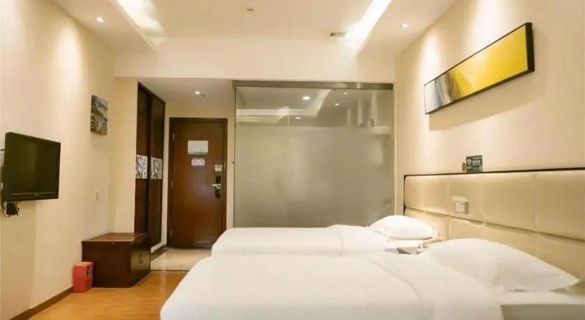 Bed in GreenTree Inn Guangzhou Panyu Bus Station Business Hotel