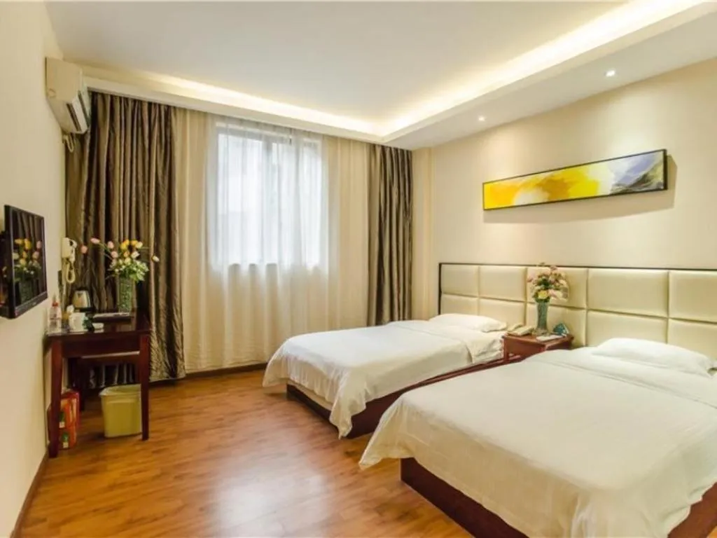 Bed in GreenTree Inn Guangzhou Panyu Bus Station Business Hotel