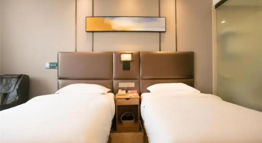 Bed in GreenTree Inn Guangzhou Panyu Bus Station Business Hotel