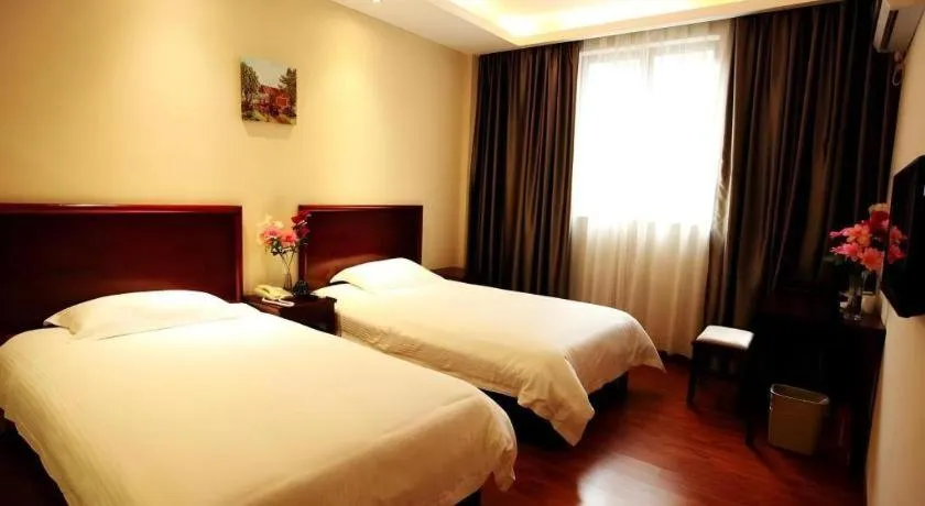 Bed in GreenTree Inn Guangzhou Panyu Bus Station Business Hotel
