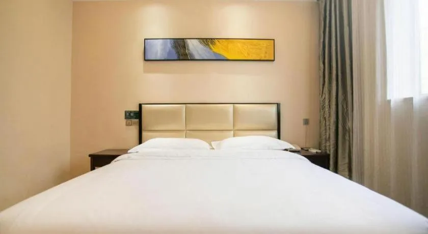 Bed in GreenTree Inn Guangzhou Panyu Bus Station Business Hotel