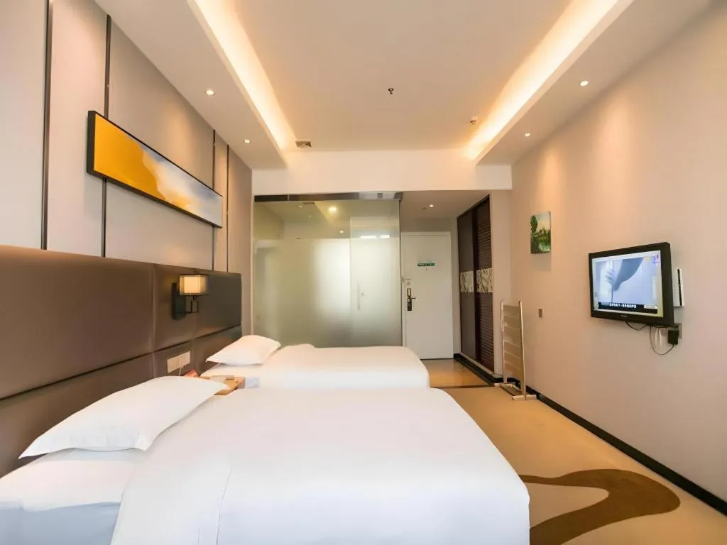 Bed in GreenTree Inn Guangzhou Panyu Bus Station Business Hotel