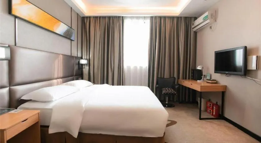 Bed in GreenTree Inn Guangzhou Panyu Bus Station Business Hotel