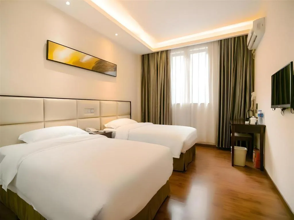 Bed in GreenTree Inn Guangzhou Panyu Bus Station Business Hotel