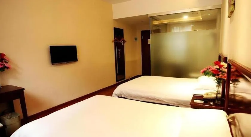 Bed in GreenTree Inn Guangzhou Panyu Bus Station Business Hotel