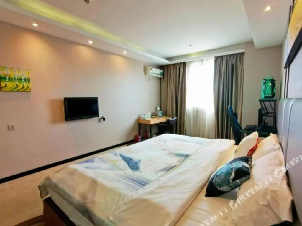 Bed in GreenTree Inn Guangzhou Panyu Bus Station Business Hotel