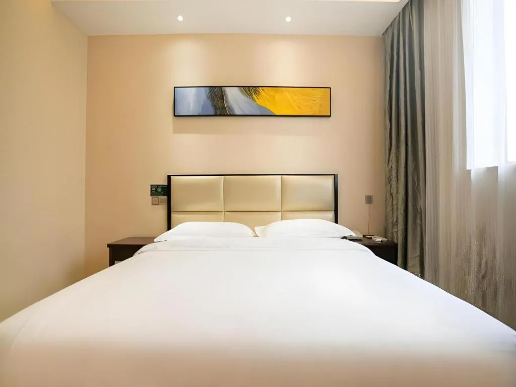 Bed in GreenTree Inn Guangzhou Panyu Bus Station Business Hotel