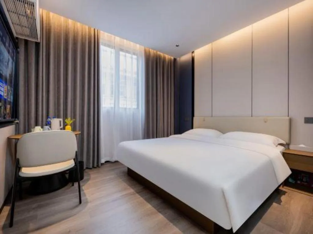 Bed in GreenTree Inn Guangzhou Panyu Bus Station Business Hotel