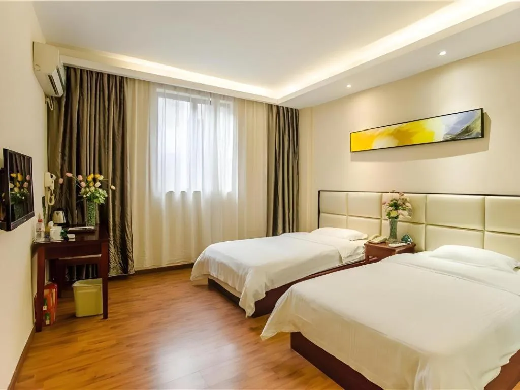 Bed in GreenTree Inn Guangzhou Panyu Bus Station Business Hotel