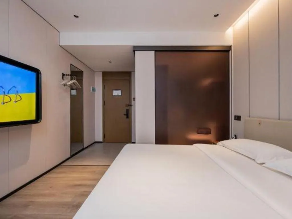 Bed in GreenTree Inn Guangzhou Panyu Bus Station Business Hotel