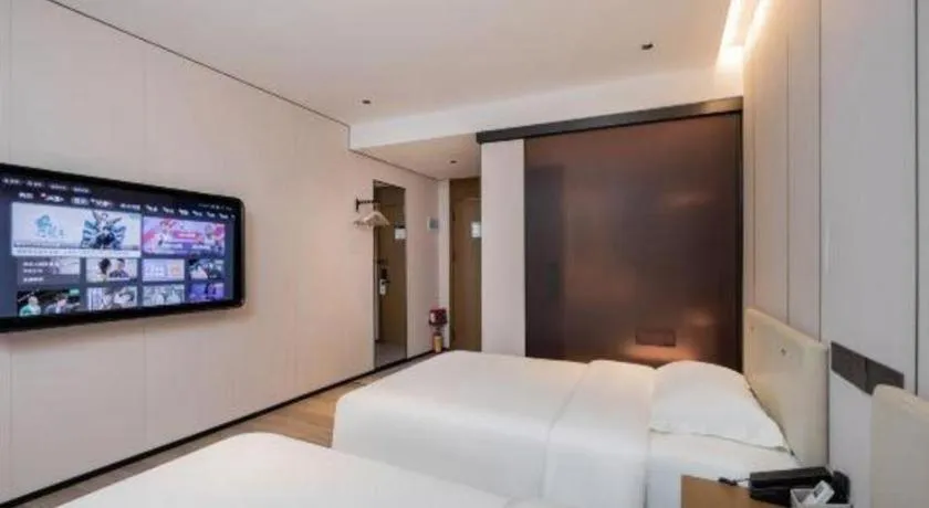 Bed in GreenTree Inn Guangzhou Panyu Bus Station Business Hotel