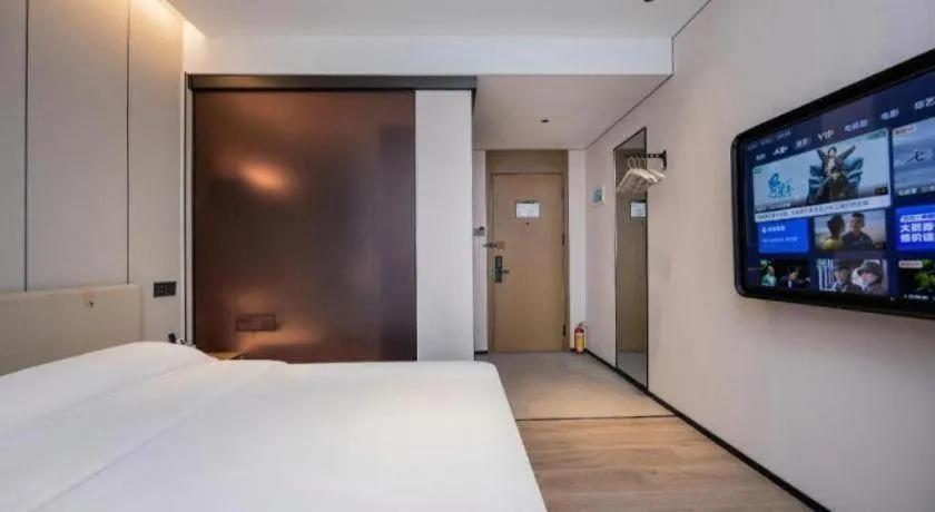 Bed in GreenTree Inn Guangzhou Panyu Bus Station Business Hotel