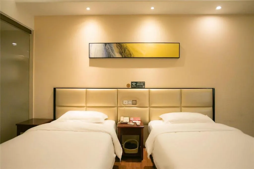 Bed in GreenTree Inn Guangzhou Panyu Bus Station Business Hotel