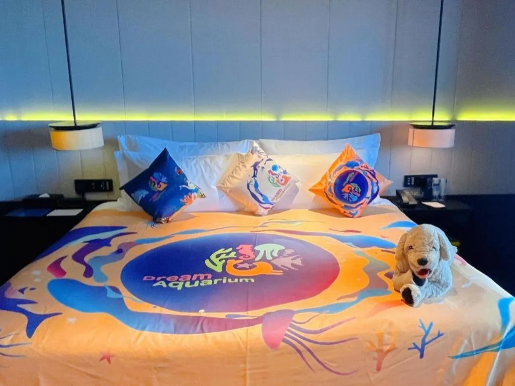 Bed in OCT Bay Breeze Hotel