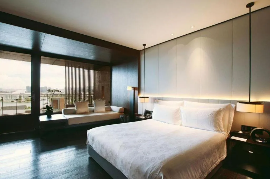 Bed in OCT Bay Breeze Hotel