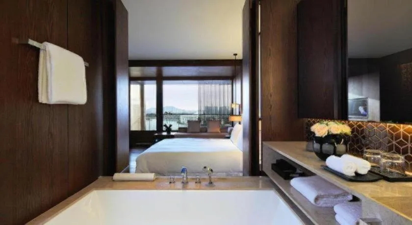 Bed in OCT Bay Breeze Hotel