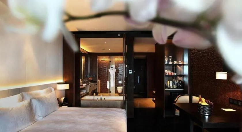 Bed in OCT Bay Breeze Hotel