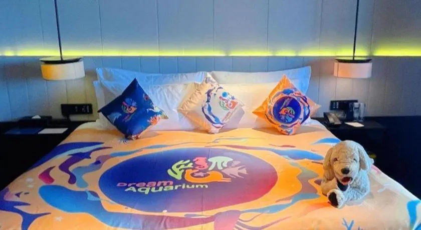 Bed in OCT Bay Breeze Hotel