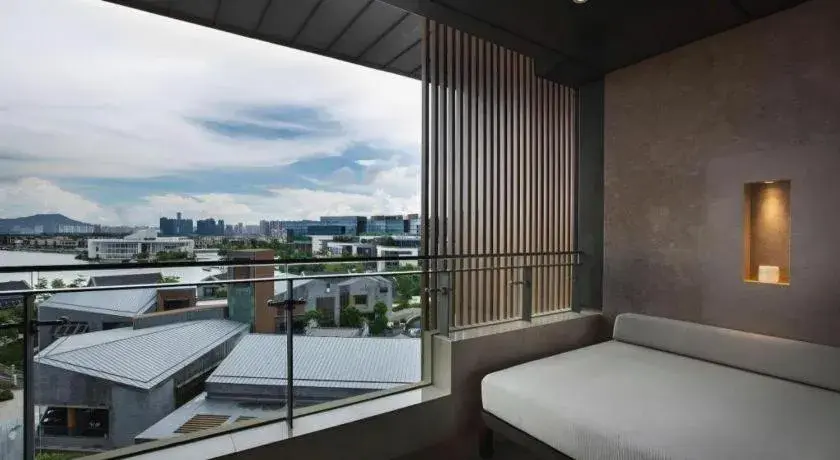 Bed in OCT Bay Breeze Hotel Bed in OCT Bay Breeze Hotel